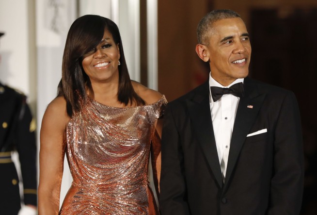 Netflix says it has signed Barack and Michelle Obama