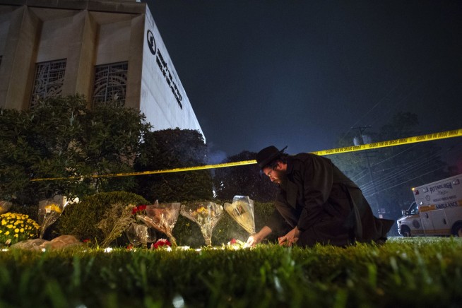The Latest: Synagogue shooting suspect pleads not guilty
