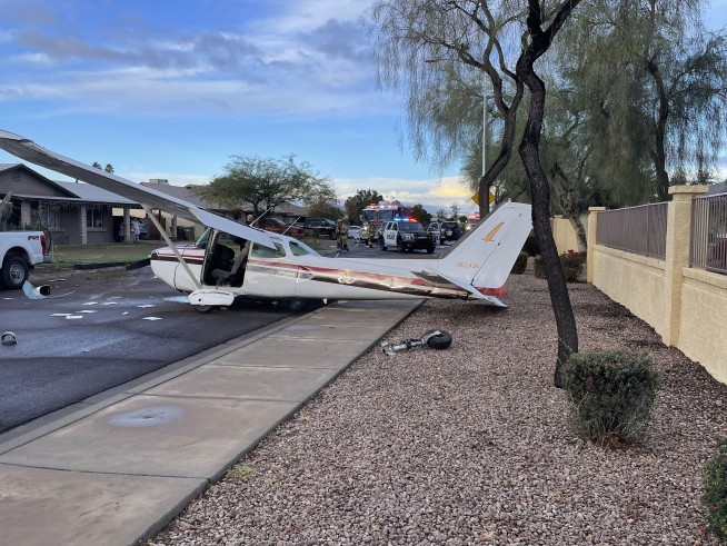 No one hurt when small plane makes crash landing on residential street in suburban Phoenix
