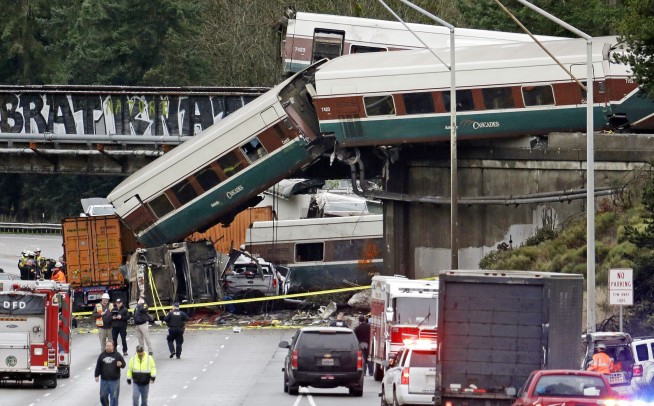 The Latest: 2 critical, 11 seriously injured in derailment