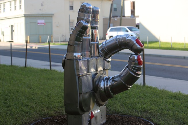 Not OK? Sculpture of hand gesture moved over gang worries