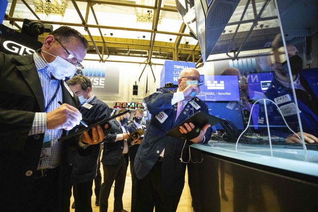 Stocks drift lower on Wall Street; yields continue to ease