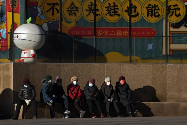 Chinese port city reports 41 virus cases, amid mass testing