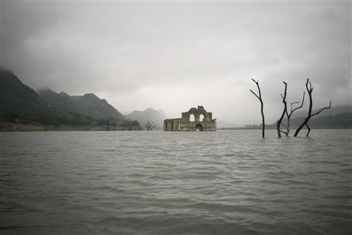 Colonial church emerges from falling Mexican reservoir