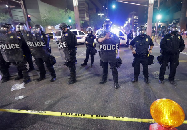 The Latest: Police say 4 arrested in connection with rally