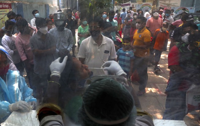 Virus 'swallowing' people in India; crematoriums overwhelmed