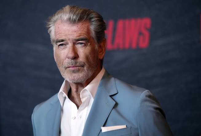 Pierce Brosnan pleads guilty to walking off trail at Yellowstone hot springs, must pay $1,500