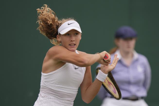 Russian teen Mirra Andreeva helps herself at Wimbledon in reaching ...