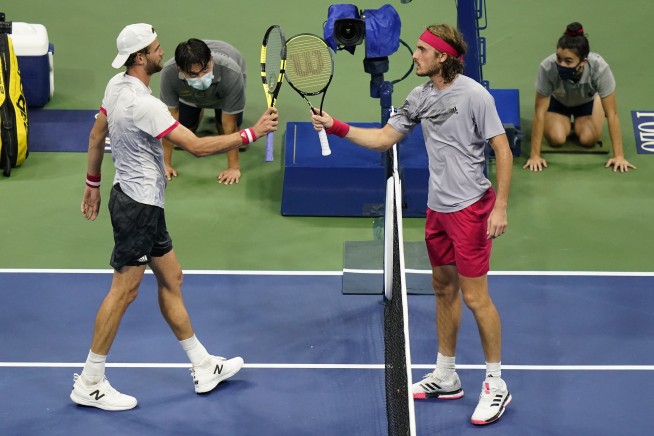 Handshakes at US Open rare but, as Djokovic shows, do happen