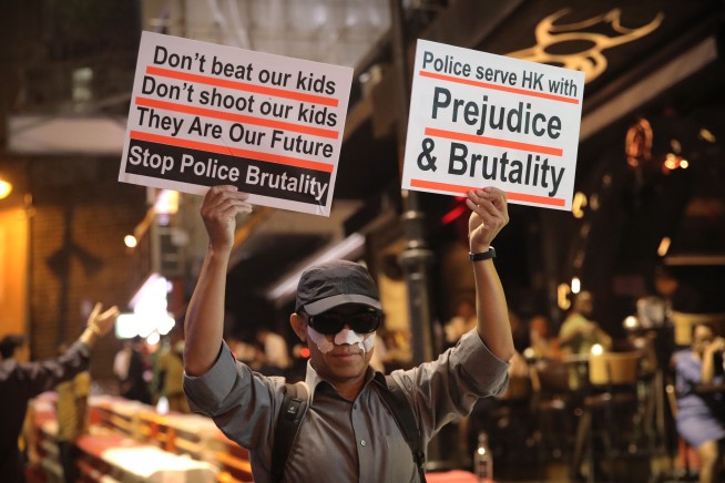 Hong Kong protesters, police in Halloween standoff