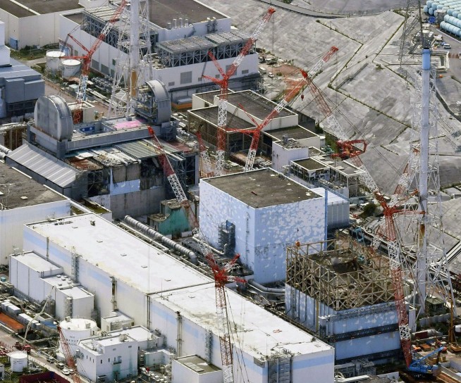 Removal of fuel in pool at Fukushima's melted reactor begins