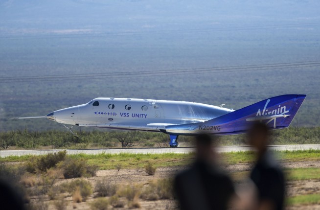 Virgin Galactic's first space tourists finally soar, an Olympian and a mother-daughter duo