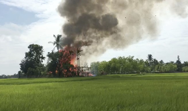 New Myanmar fires in empty Rohingya village raise questions