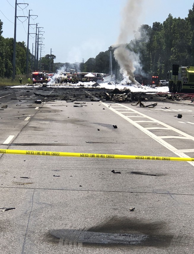 The Latest: Trump tweets thoughts, prayers for crash victims