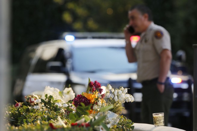 Gunman who killed 12 died from self-inflicted gunshot