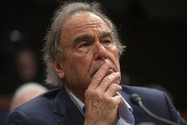 'JFK' director Oliver Stone calls for a reinvestigation of Kennedy's 1963 assassination