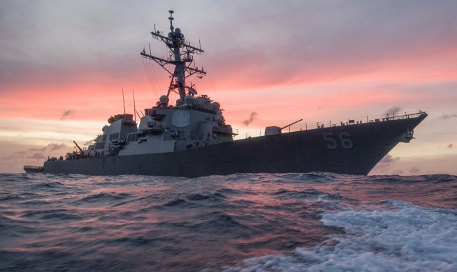 Damaged USS John S. McCain arrives in Singapore; 10 missing