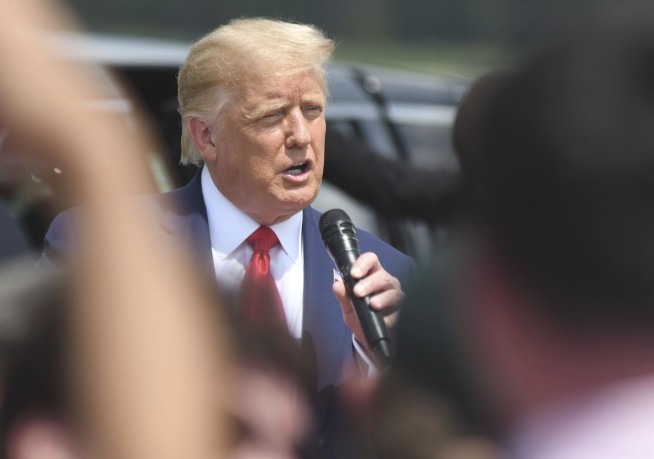 Trump suggests polling place double-check for mail-in voters