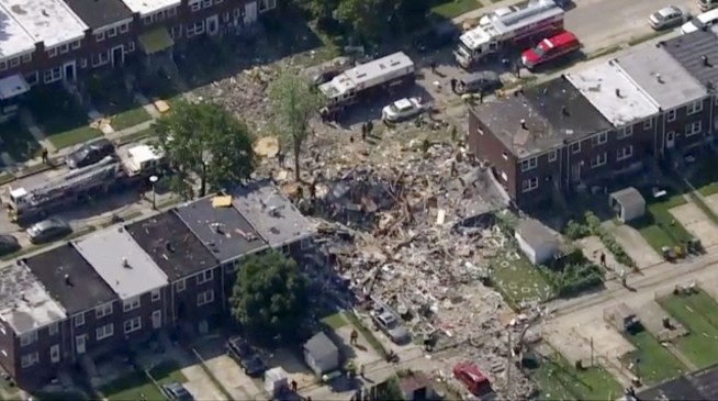 Gas explosion levels 3 Baltimore homes; 1 dead, 1 trapped