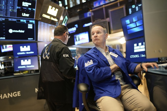 Wall Street storms back from early losses, echoing its manic moves through a historic April
