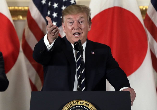 Trump opens state visit, needles Japan over trade issues