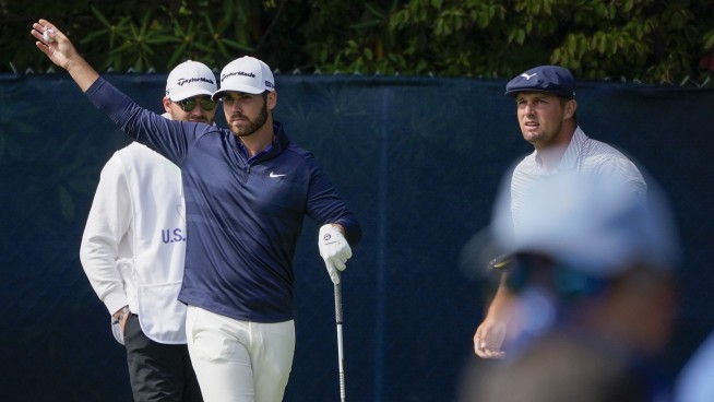 The Latest: DeChambeau bombs away, pulls away to win US Open