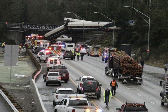 The Latest: 2 critical, 11 seriously injured in derailment