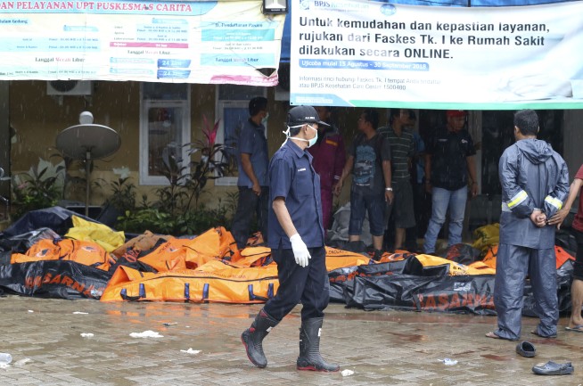 The Latest: Death toll climbs to 222 in Indonesia tsunami