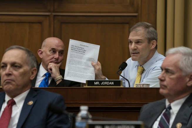 The Latest: House panel votes to hold AG Barr in contempt