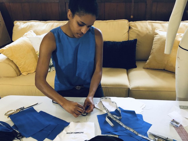 Volunteers sew masks for health workers facing shortages