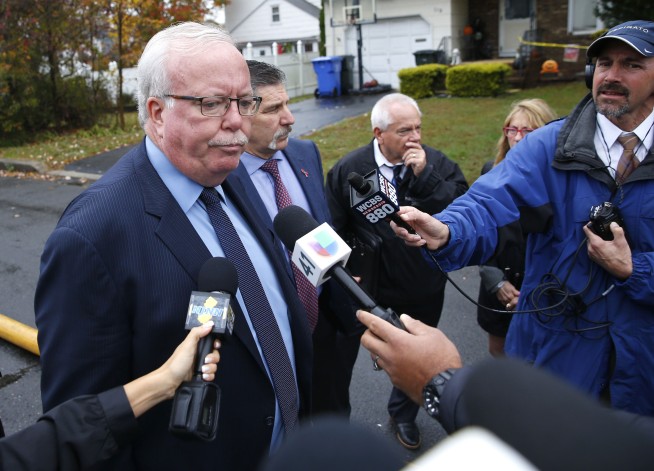 Small plane crashes, leaving pilot dead, houses ablaze