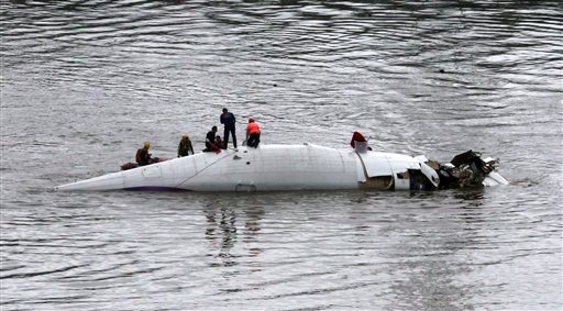 Taiwan plane with 58 aboard crashes in Taipei; 19 killed