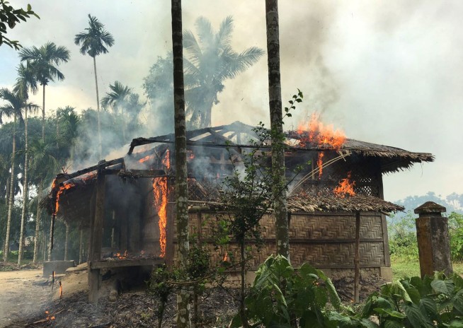 New Myanmar fires in empty Rohingya village raise questions