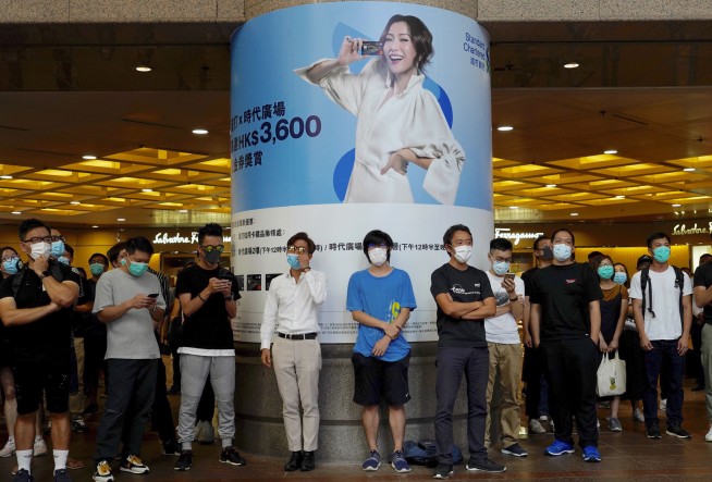 Hong Kong leader bans masks in hardening stance on protests