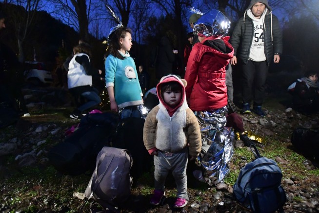 Turkey, Syria fighting escalates; refugees mass at EU border