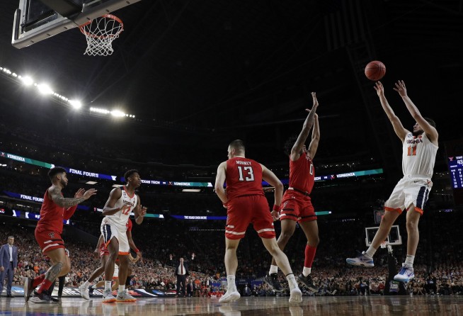 NCAA Latest: Virginia's clutch tourney goes down in history