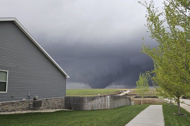 Midwest tornadoes flatten homes in Nebraska suburbs and leave trails of damage in Iowa
