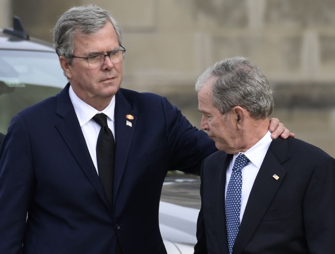 Trump odd man out as presidents assemble for Bush funeral