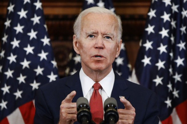 Mail ballots from Tuesday's election push Biden over the top