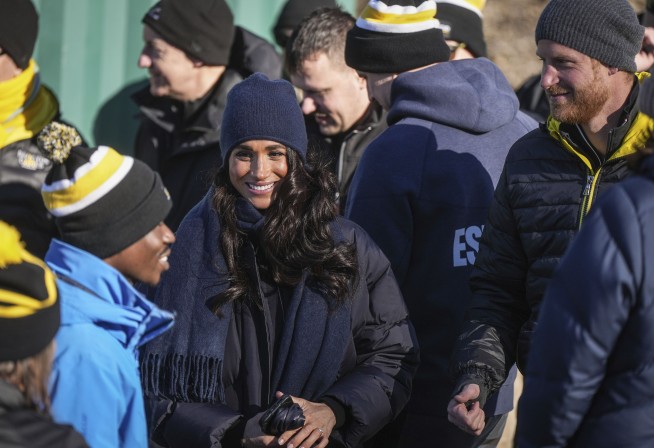 Prince Harry races head-first down a skeleton sled track and says 'everybody should do this'