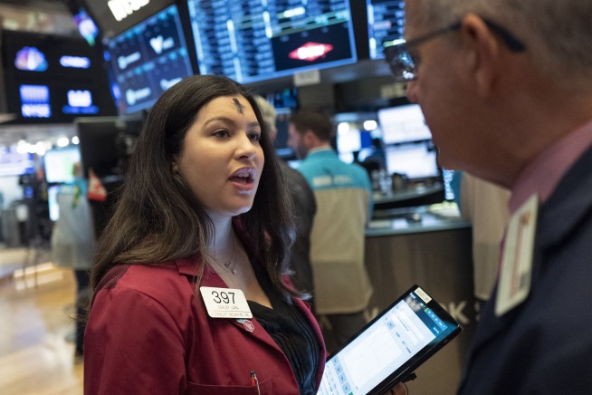 Stocks slide on Wall Street, extending steep drops this week