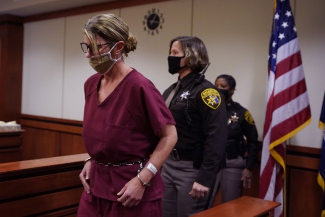 Judge delays case against Michigan school suspect's parents