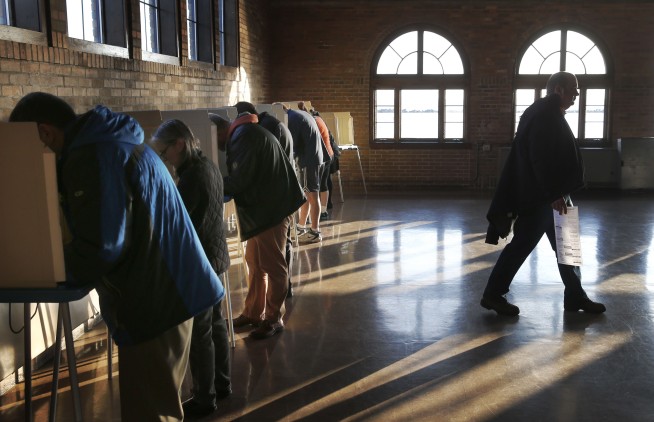 The Latest: Wisconsin voter turnout projected at 40 percent