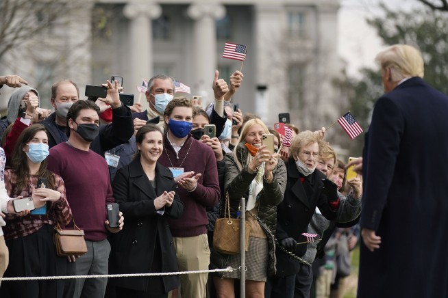 Trump helicopter buzzes supporters rallying in Washington