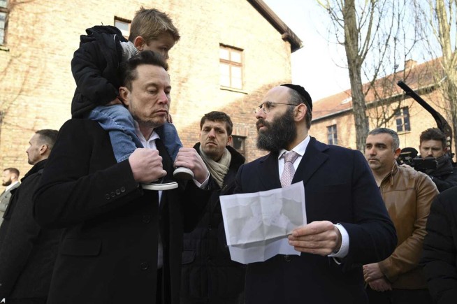 Elon Musk visits Auschwitz after uproar over antisemitic messages on X