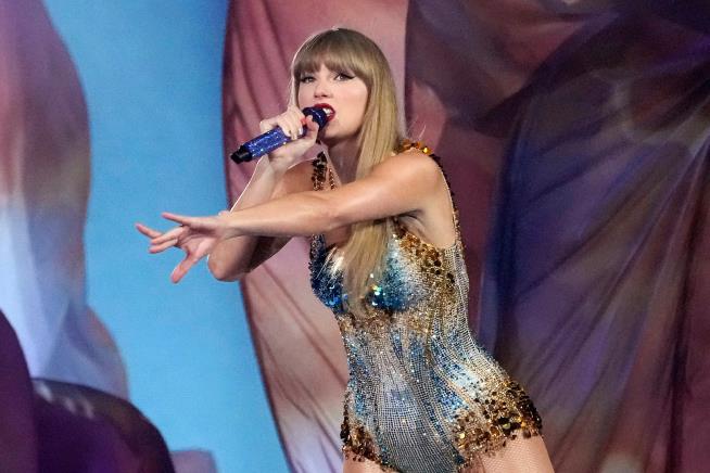 Lawsuit says Taylor Swift's 'Showgirl' pose comes too close to the work of a real one