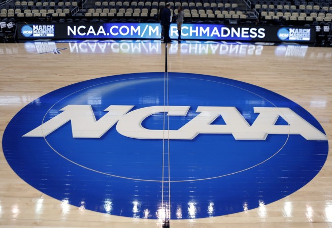 NCAA passes series of rules that sets table for schools to pay players directly