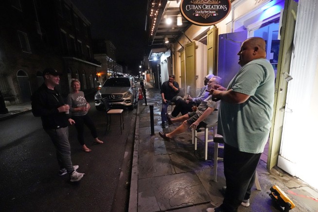 Zeta barrels northeast after battering storm-weary coast