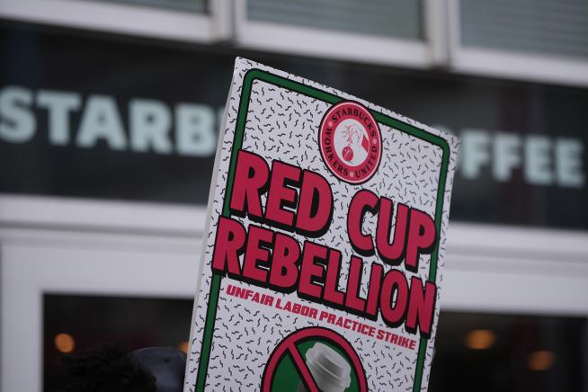 Starbucks workers kick off 65-store US strike on company's busy Red Cup Day