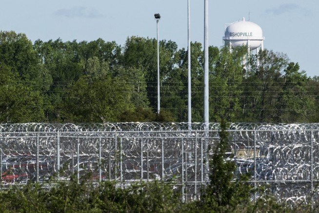Inmate: Bodies stacked in 'macabre woodpile' in prison riot